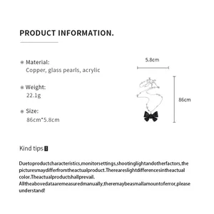 Scheda info collana con fiocco a pois neri con dimensioni e specifiche dei materiali