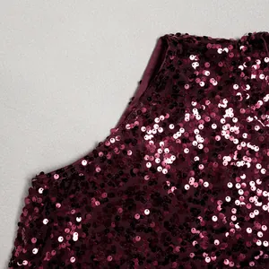 Detailed close-up view of shiny dark wine red sequins on an elegant mesh splicing party dress