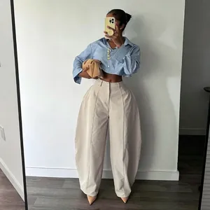Loose silhouette beige wide-leg commute trousers for women in a stylish outfit view