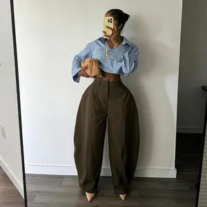 Chic women's oversized wide-leg brown trousers with high waist and structured fit