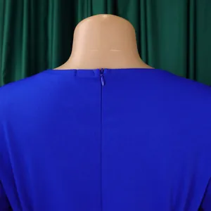 Close-up detail of the back hidden zipper on a royal blue elegant dress.