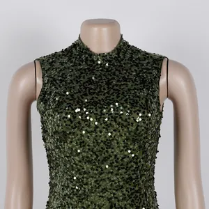 Close-up of elegant dark green sequin sleeveless dress with high neckline.