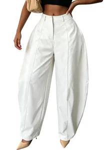 Full length view of white high-waisted wide-leg trousers showing pleats and fit