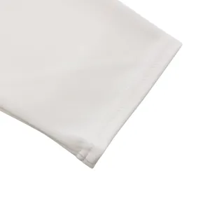 Close-up detail of white midi dress sleeve showing neat double stitching and soft fabric