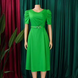 Elegant green V-neck pleated midi dress with belt shown on mannequin for details