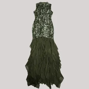 Close-up of olive green sequined bodice and layered mesh tulle skirt of this elegant gown.