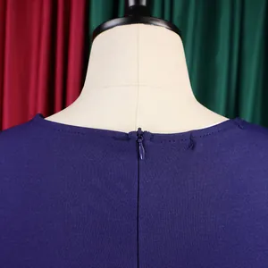Detailed back view of navy blue dress showing invisible zipper and fine stitching.