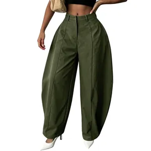 Detailed view of high-waist olive green wide-leg pants with balloon silhouette