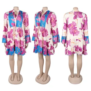 Front, side, and back views of a floral print V-neck mini dress with bell sleeves