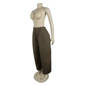Detailed side view of women's loose-fit brown commuter trousers on a mannequin