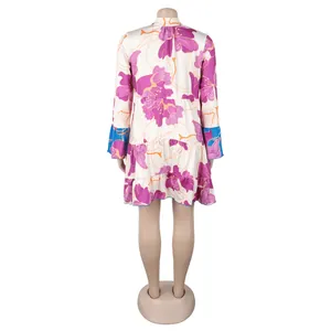 Rear view of elegant loose floral print short dress with blue contrast ruffle cuffs