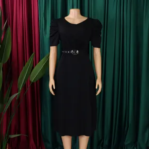 Front view of an elegant black V-neck pleated dress with puffed sleeves on mannequin