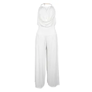 Elegant white two-piece set featuring halter neck draped top and wide-leg trousers