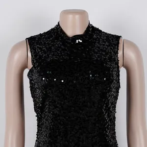 Detailed close-up view of black sequined sleeveless evening dress on a mannequin torso