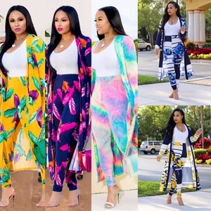 Women's two-piece set with floral cardigan and matching high-waisted pants in multiple colors