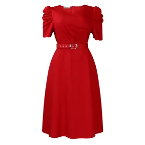 Detailed view of elegant red V-neck pleated midi dress with puff sleeves and belt