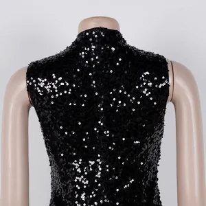 Detailed back view of an elegant black sequin bodycon dress on a studio mannequin