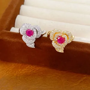 Exquisite 14k gold plated flower open ring featuring red gemstone and pavé zirconia detail