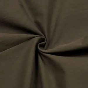 Close-up view of dark olive green twill fabric texture showing detailed weave pattern