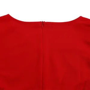Macro view of the hidden back zipper on an elegant and vibrant red summer dress
