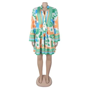 Bohemian V-neck long sleeve floral print tiered mini dress with abstract patterns