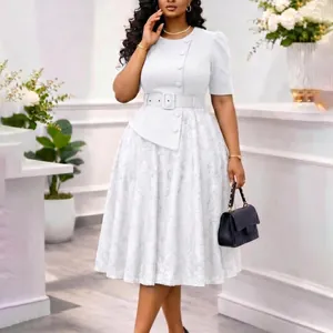 Detailed view of the white lace splicing dress with buttoned bodice and waist belt.