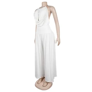 Side view of an elegant white halter neck pleated top and wide-leg trousers set