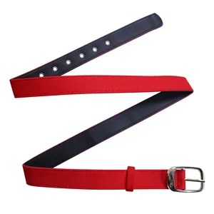 Detailed view of a bright red fabric belt featuring a silver buckle and metal eyelets