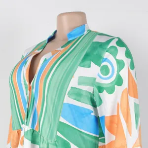 Close-up detail showing the vibrant floral print and V-neckline of this mini dress