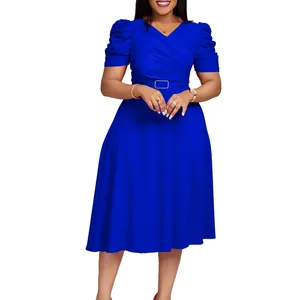 Detailed view of an elegant royal blue V-neck pleated midi dress with puff sleeves.