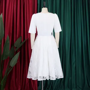 Back view of elegant white lace patchwork high-waist dress with short sleeves and belt