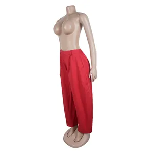 Side view of red wide-leg commuter casual trousers on a mannequin