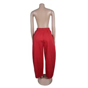Back view of vibrant red loose-fit silhouette wide-leg trousers for casual wear