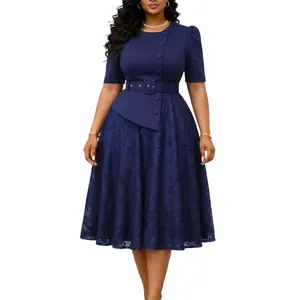 Detail view of navy blue plus size dress with lace patchwork and belt.