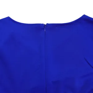 Close-up detail of the hidden zipper on the back of a royal blue summer dress.