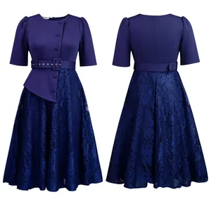 Front and back view of a dark blue lace patchwork dress with puff sleeves and belt
