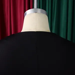 Close-up detail of the back collar and fine stitching on a chic black short sleeve top