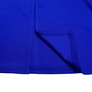 Detailed macro shot of professional stitching on a vibrant royal blue dress hemline.