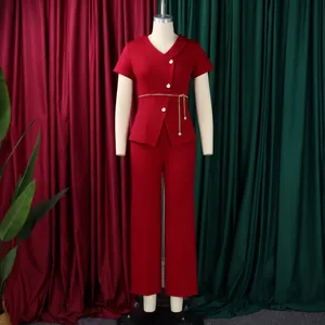 Elegant red two-piece set with short sleeve top and wide leg pants featuring daisy buttons