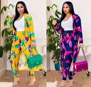 Sexy vibrant feather print two-piece set with long cardigan and matching pants.