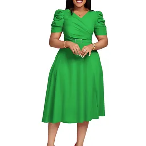 Chic green midi dress featuring a V-neckline, puff sleeves, and pleated details