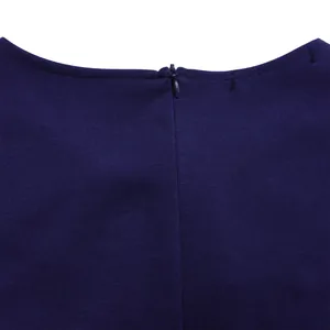 Close-up detail of the durable hidden back zipper and smooth neckline on a navy blue dress