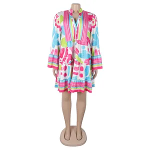 Vibrant floral print V-neck spliced mini dress with tiered hem and bell sleeves
