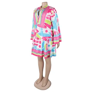 Colorful loose-fit V-neck short dress with vibrant floral abstract print design.