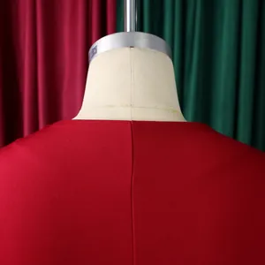 Detailed macro view of the back seam and collar on a stylish red short sleeve top