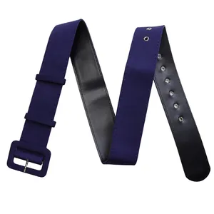 Detail view of the navy blue fabric belt with a rectangular fabric-covered buckle
