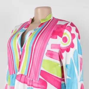 Detailed view of elegant floral and striped print V-neck color-block mini dress