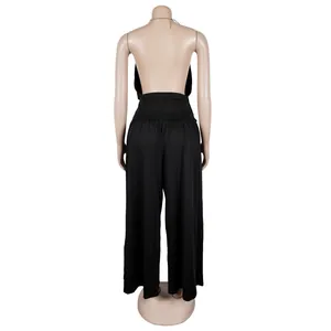 Detailed back view of elegant black halter neck pleated wide leg two-piece clothing set