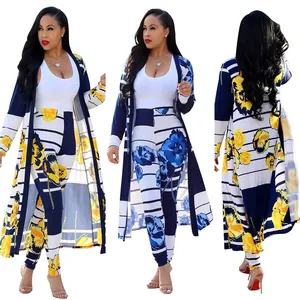 Three-way view of a sexy floral print long cardigan and leggings set in navy and yellow.