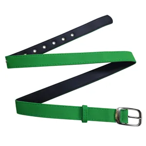 Close-up detail of a green canvas belt featuring a silver buckle and black inner lining